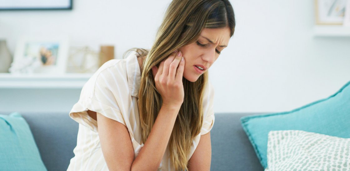 Cropped shot of an attractive woman experiencing a toothache