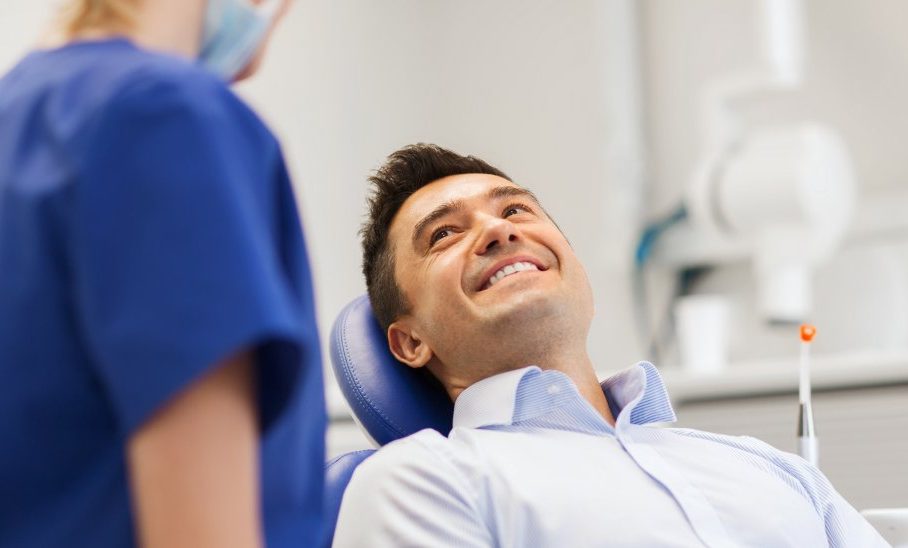 Man smiling in dentist chair