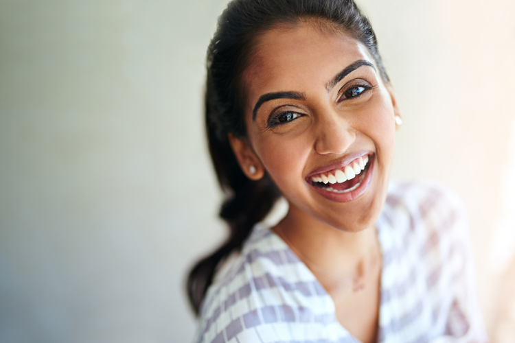 Woman smiling | Protect your teeth | Dentek